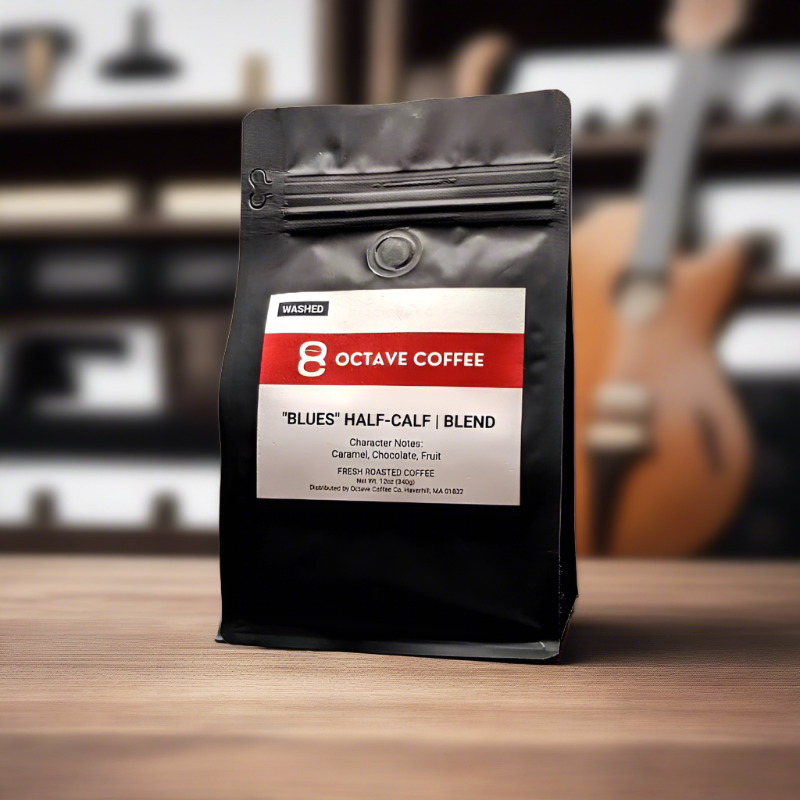 black bag of "blues" coffee with guitar in the background