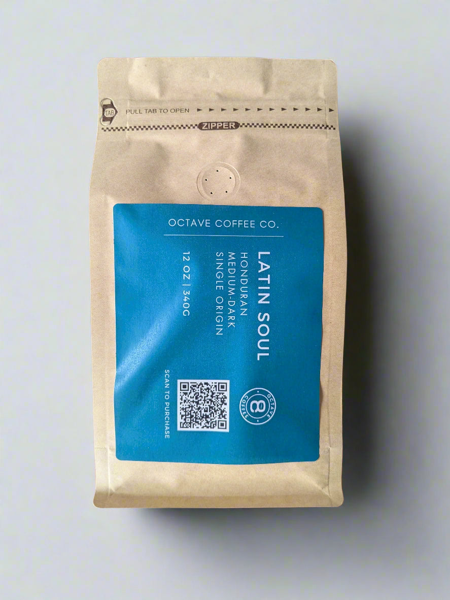 A packaged bag of 'Latin Soul' Honduran coffee from Octave Coffee Co., with a blue label displaying the product name and QR code.